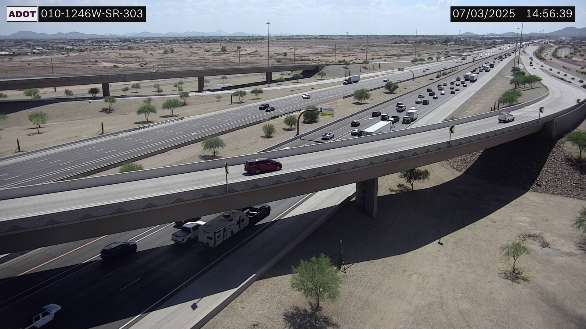 Traffic Cam I-10 WB 124.60 @L-303/Cotton Lane -  Westbound